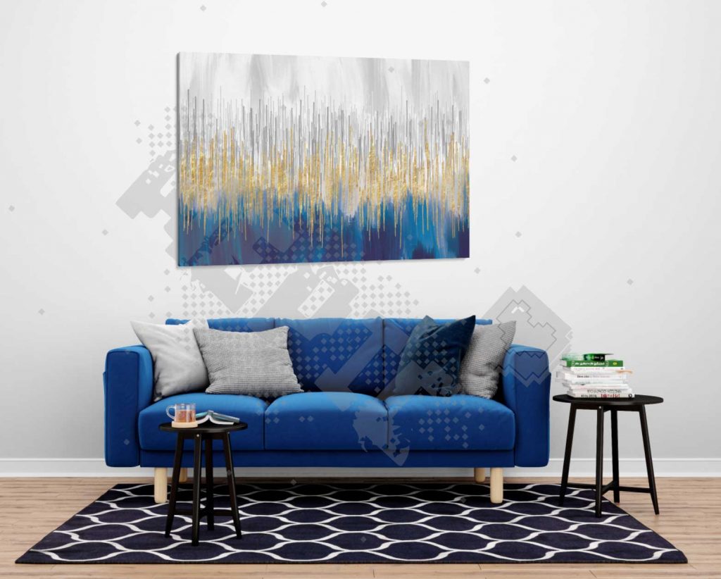 un tableau abstrait en bleu et doré et argenté