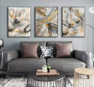 ensemble de 3 tableaux en doré et gris